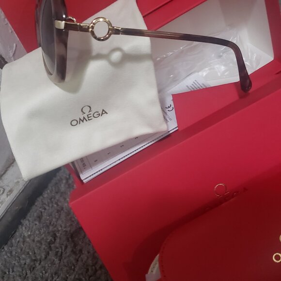 Brand new, never worn OMEGA women\'s sunglasses main image 3